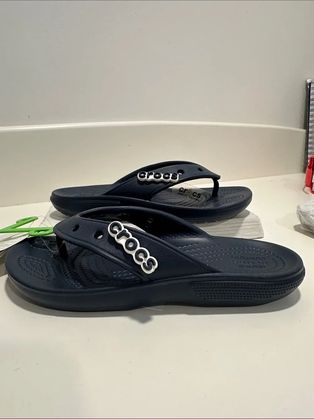 CROCS Navy Blue Foam Flip Sandals with White Logo Accent 342